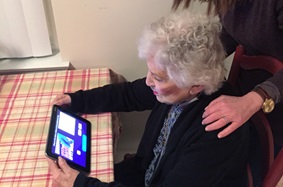Elderly home health patient using Telehealth tablet