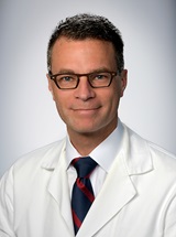 headshot of Geoffrey Karl Aguirre, MD, PhD
