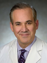 headshot of Timothy W.I. Clark, MD