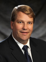 headshot of Timothy R. Dillingham, MD, MS