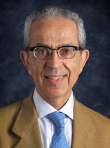 headshot of Malek Kamoun, MD, PhD