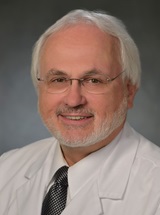 headshot of Dennis L. Kolson, MD, PhD