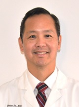 headshot of Adrian Lo, MD, FRCS, FACS