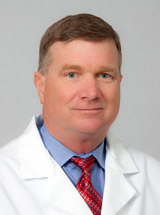 headshot of Christopher J. Lyons, MD