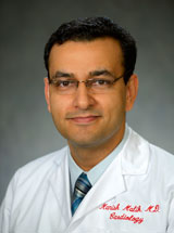 headshot of Manish G. Malik, MD, FACC, RPVI