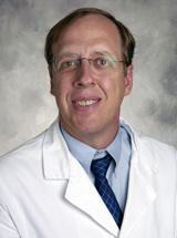 headshot of David E. Nicklin, MD