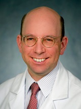 headshot of Alexander E Perl, MD