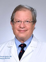 headshot of Richard M. Saunders, MD