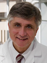 headshot of Stephen J. Schuster, MD