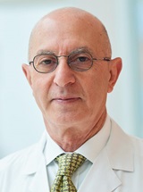 headshot of Abraham Shaked, MD, PhD