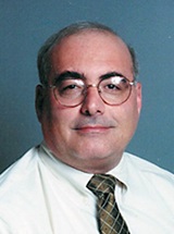 headshot of Dwight E. Stambolian, MD, PhD