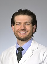 headshot of Jordan E. Stone, MD