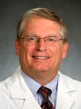 headshot of David J. Vaughn, MD
