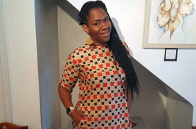 Angela Banks-Konate poses of a photo after bariatric surgery