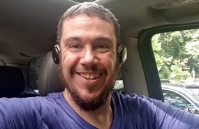 Shawn W taking selfie in car after bariatric surgery