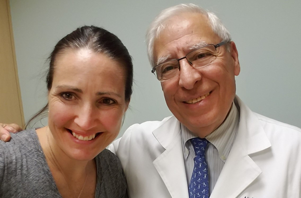 Nancy with doctor smiling