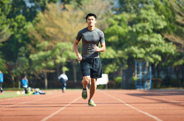 Man running on track