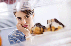 Woman looking into the refrigerator