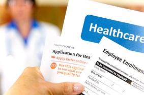 Close-up view of health insurance benefit application forms
