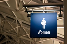 sign for women's bathroom