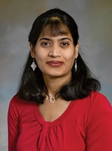 headshot of Sandhya K. Adusumilli, MD, FACP