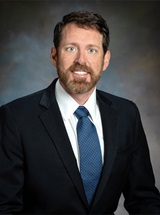 headshot of John O. Allen, MD