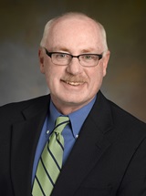 headshot of Philip M. Bayliss, MD