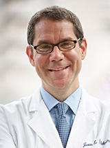 headshot of Justin E. Bekelman, MD