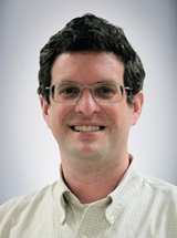 headshot of Zev Binder, MD, PhD