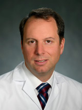 headshot of Ari D. Brooks, MD