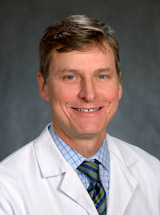 headshot of John M. Bruza, MD