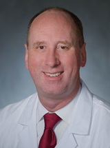 headshot of John M. Chandler, MD