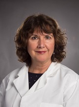 headshot of Gloria M. Cruz, MD