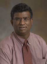 headshot of Vinesh J. Dedhia, MD