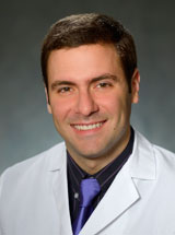 headshot of Andres Deik, MD, MSEd