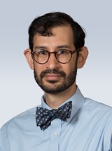headshot of Ali Haider Dhanaliwala, MD, PhD