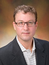 headshot of James Christopher Edgar, PhD