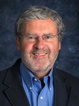 headshot of David E. Elder, MBChB
