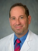 headshot of Scott Feldman, MD, PhD
