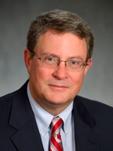 headshot of Douglas L. Fraker, MD
