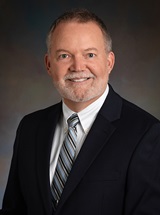 headshot of Neal S. Harnly, MD