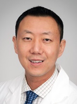 headshot of Michael He, MD, FASA