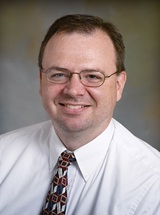headshot of Charles F. Henderson, MD