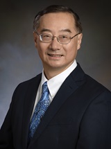headshot of J. Gabriel Hou, MD, PhD, FAAN