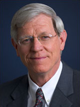 headshot of William D. James, MD