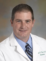 headshot of David E. Jones, MD