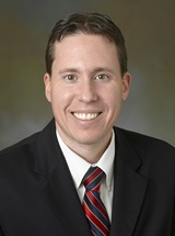 headshot of James M. Kelly, MD
