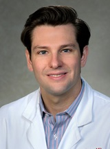 headshot of Jesse James Kiefer, MD, MSEd