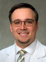 headshot of Michael S. Kinson, Jr, MD, MA