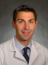 headshot of John A. Kosteva, MD